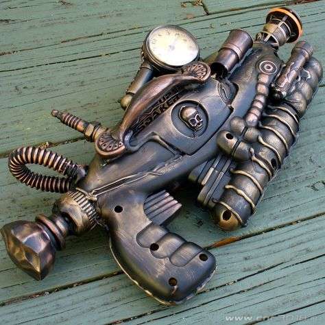 055f95146fc38eba8b6eee16fdd8e0d5--steampunk-weapons-gun-holster.jpg